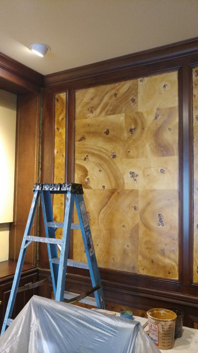 faux burl and wood grained panels and mahogany wood grained walls
