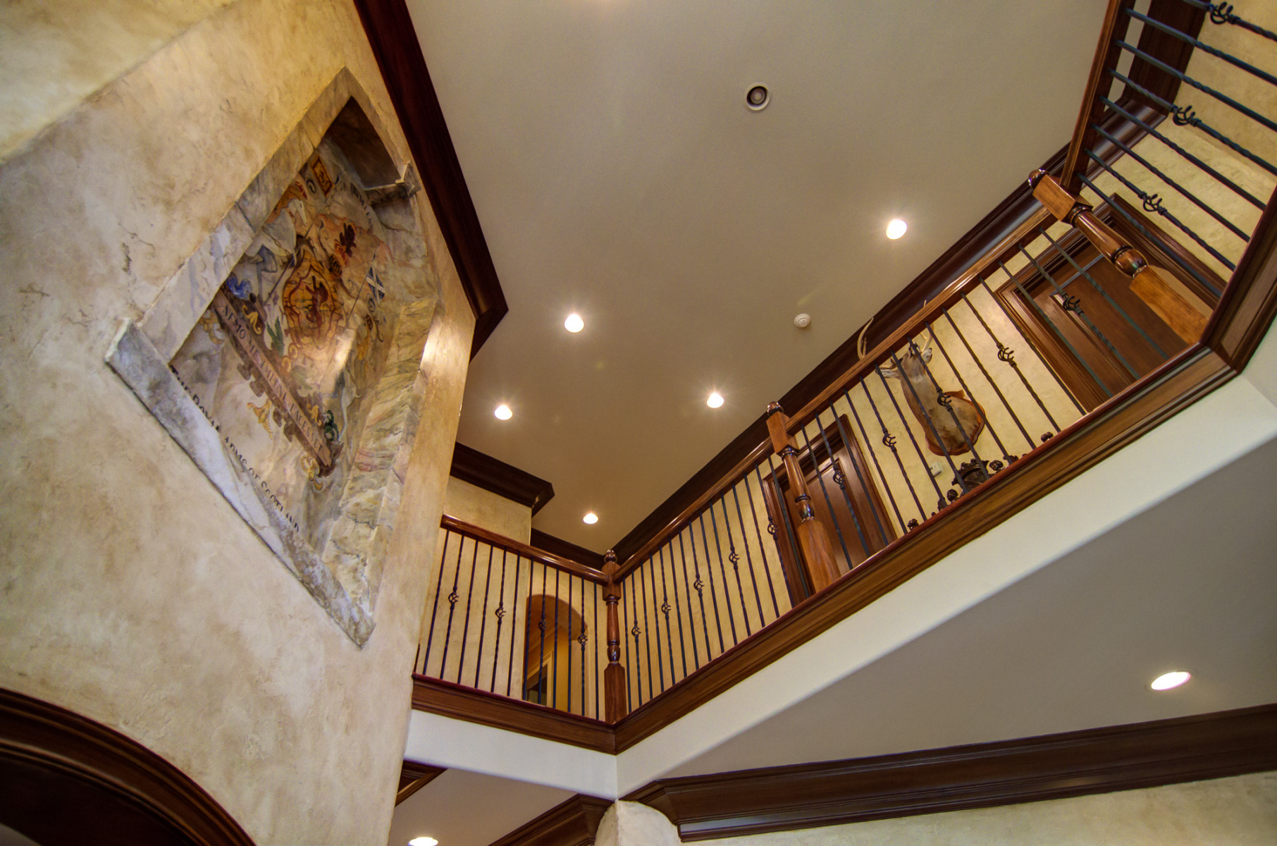 European makeover - Shot of this Brentwood customer's wood glazed trim, plaster tinted walls and 3D wall mural.