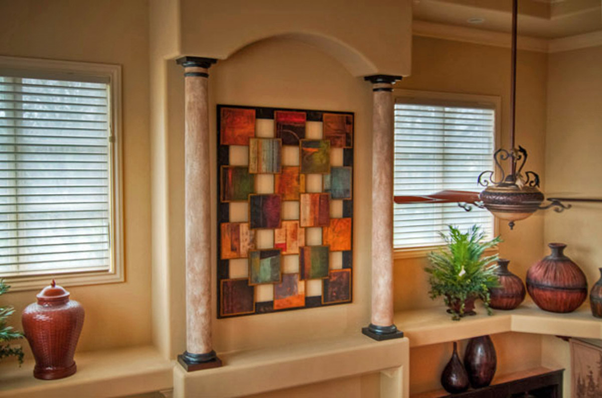 Faux stone columns and faux bronze caps and bases - it’s those special touches that take good design to great design.