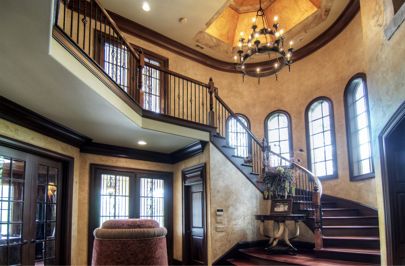 Custom ceiling design of faux gold sheeting and hand painted flourishes.