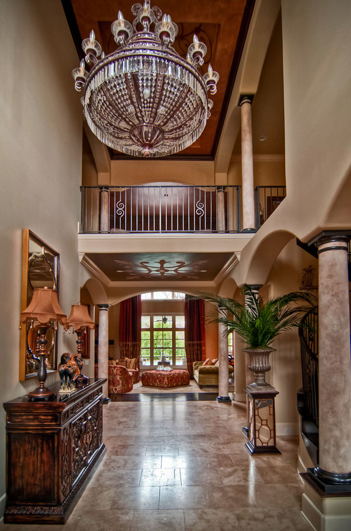 Metallic and stone ceiling design with custom-made stencil.