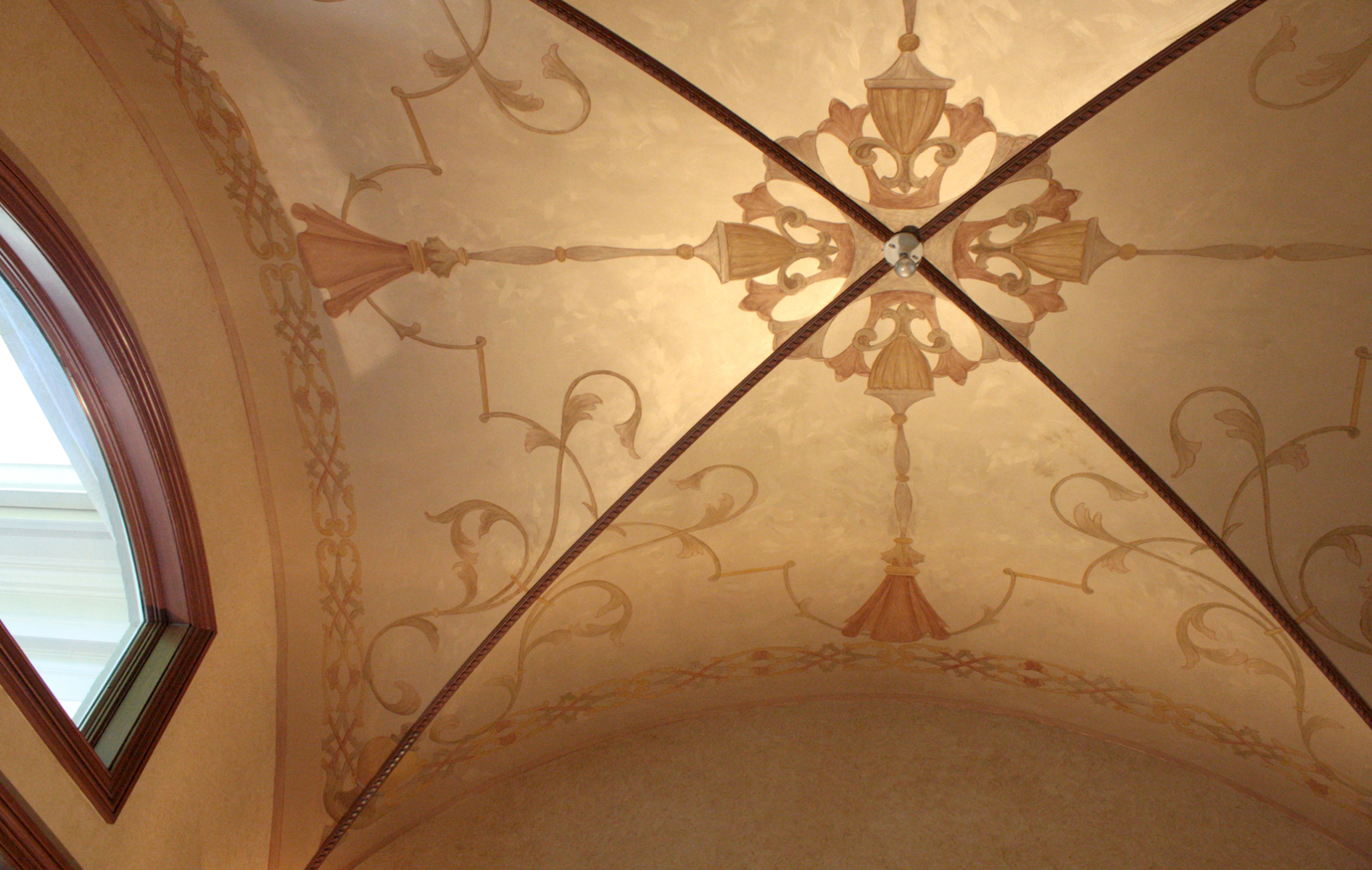 Hand enhanced stencil ceiling designs.