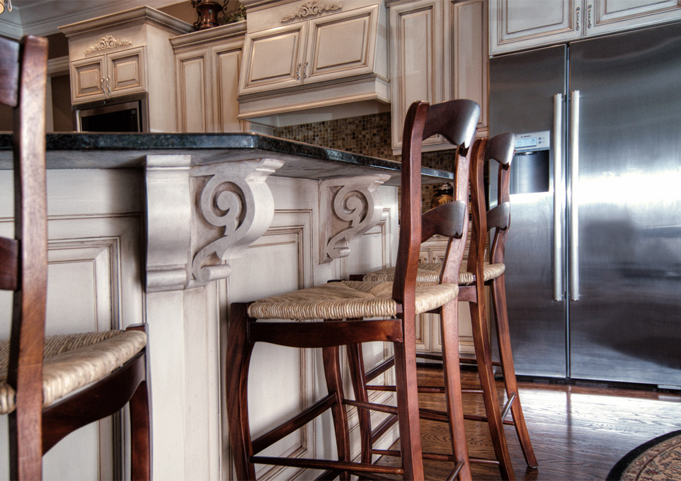 Before and After – These kitchen cabinets and breakfast bar were given a new life with modern color mixture and furniture glazing technique in Franklin, TN.