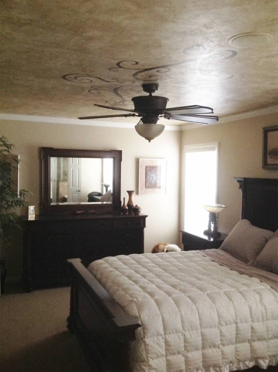 Custom bedroom ceiling design over plaster fresco.