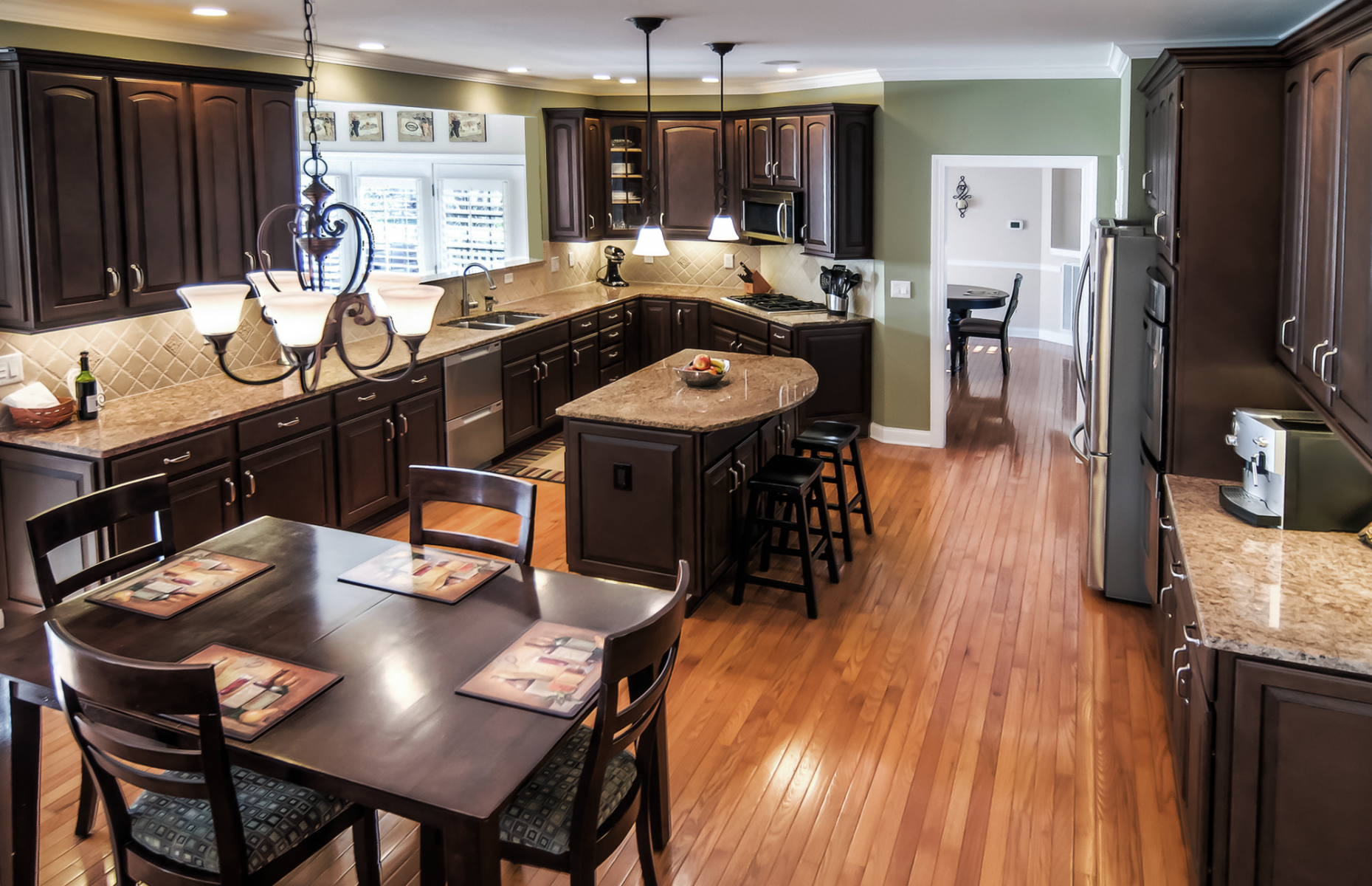 Kitchen cabinet refinishing wide view - in a rich furniture finish