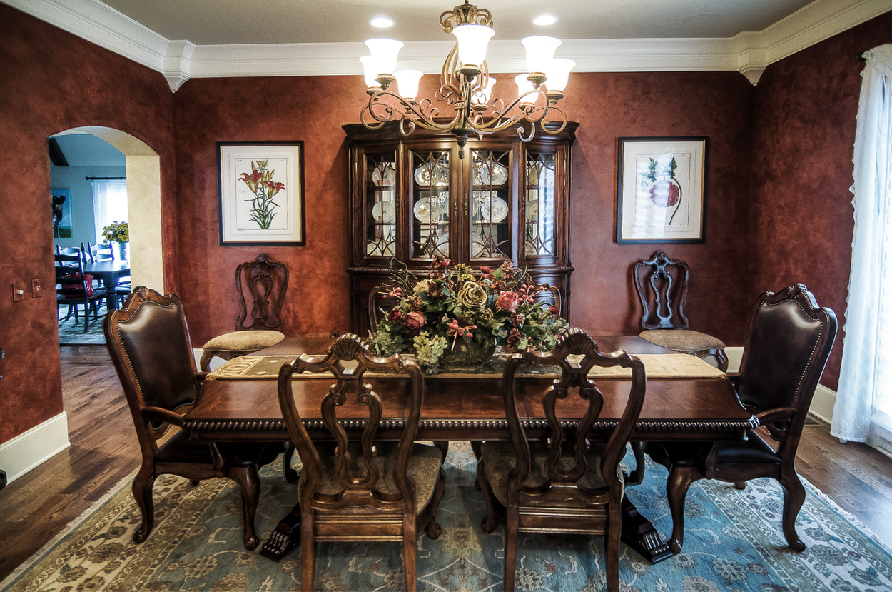Shimmering custom colored Lusterstone dining room walls and French tinted plaster entryway.