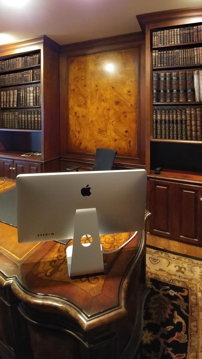 faux burl and wood grained panels and mahogany wood grained walls office view