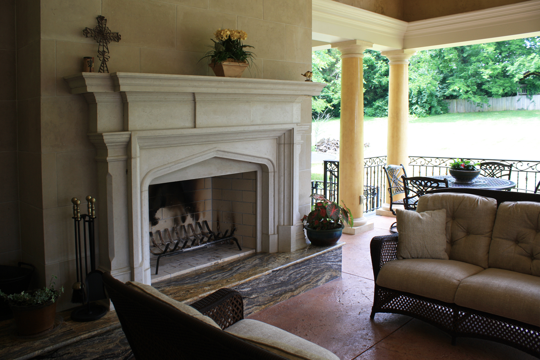 Custom designed loggia:  Venetian plaster columns with faux stone capitals and base and upper wall O’villa plaster finish.