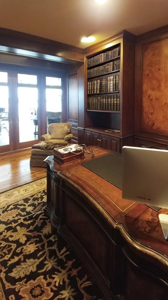 faux burl and wood grained panels and mahogany wood grained walls