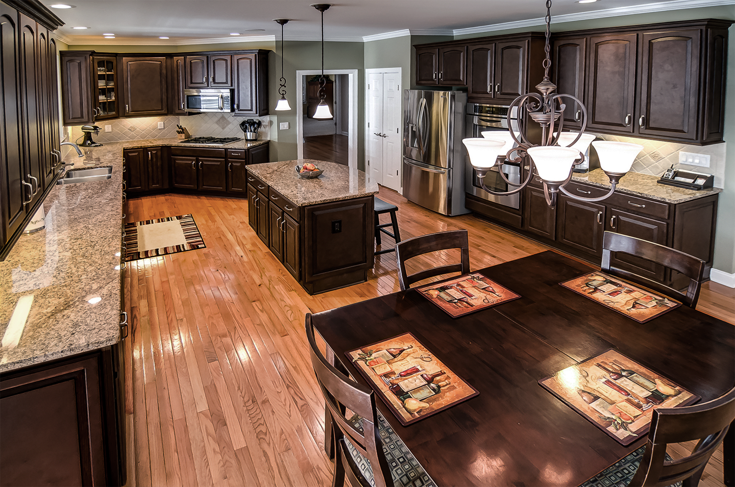 Kitchen cabinet refinished in a rich furniture finish