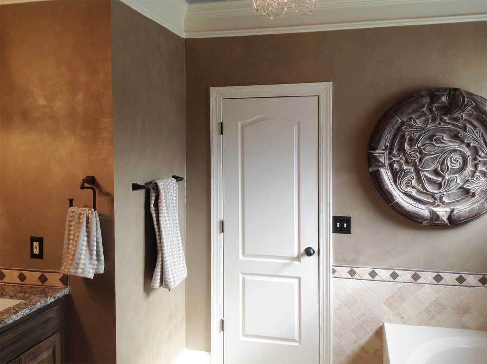 Shimmering Lusterstone walls and faux salvaged-walnut glazed vanity with blue ceiling