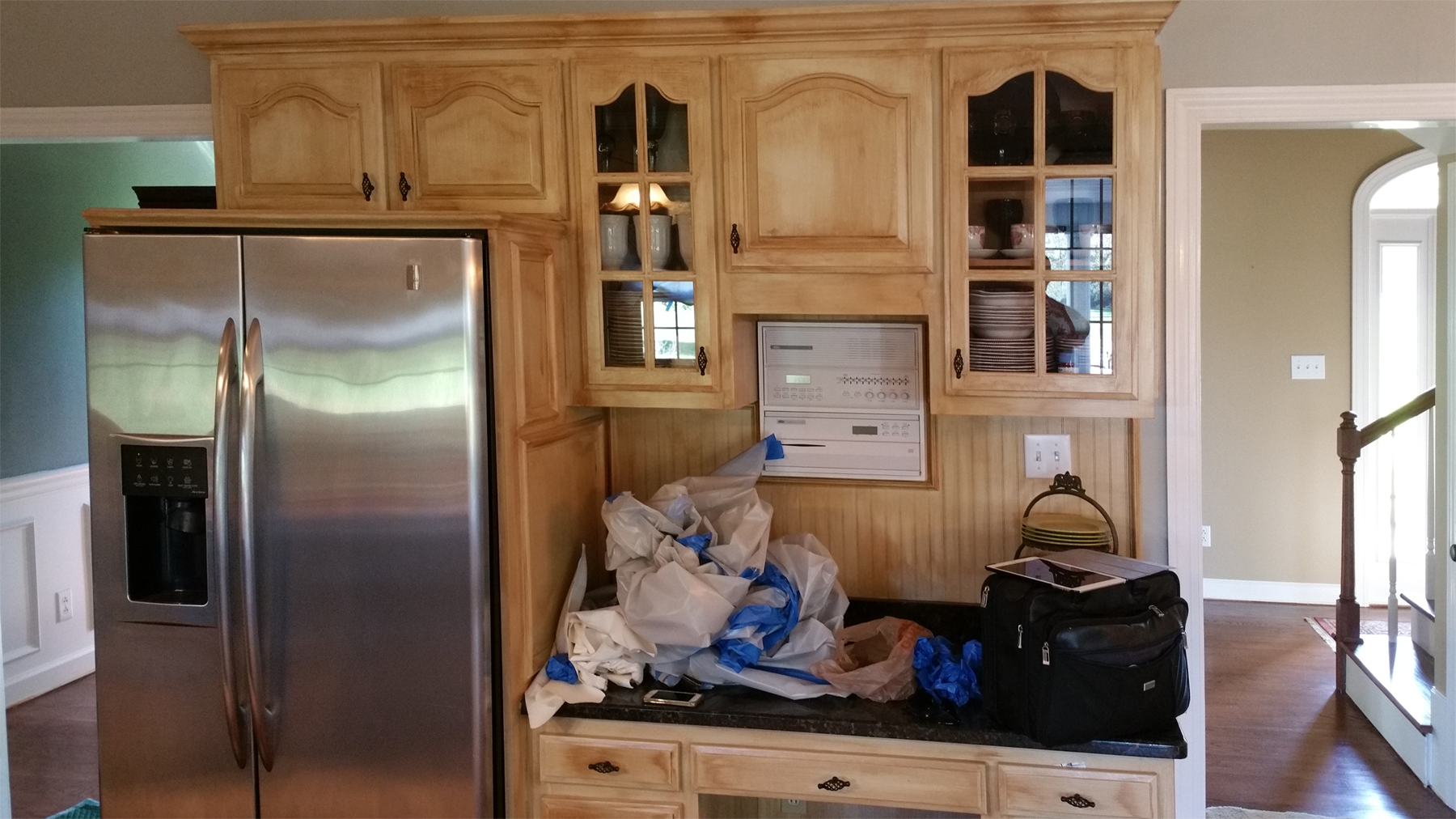 Before this Mount Juliet customer’s kitchen cabinet transformation in a warm modern Tuscan glaze.