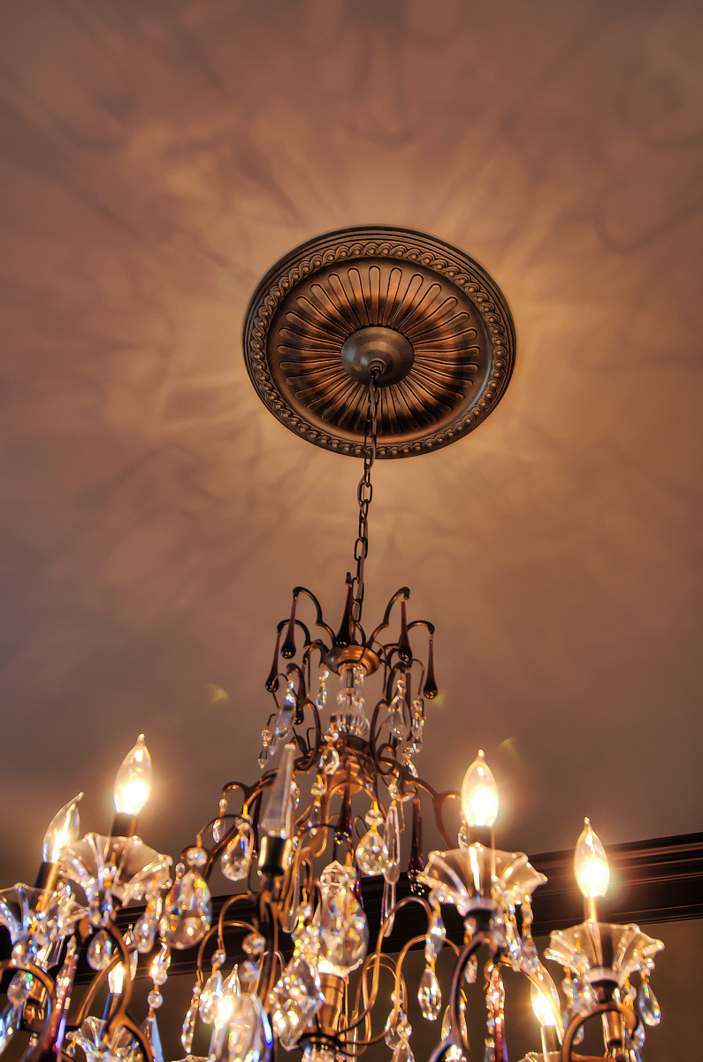 Faux metal ceiling medallion and tinted ceiling