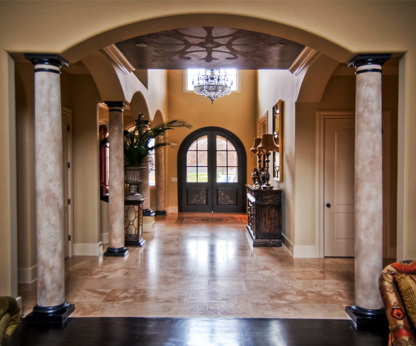 Metallic and stone ceiling design with custom-made stencil.