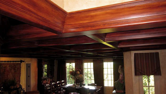 Faux wood grained coffer ceiling close-up.