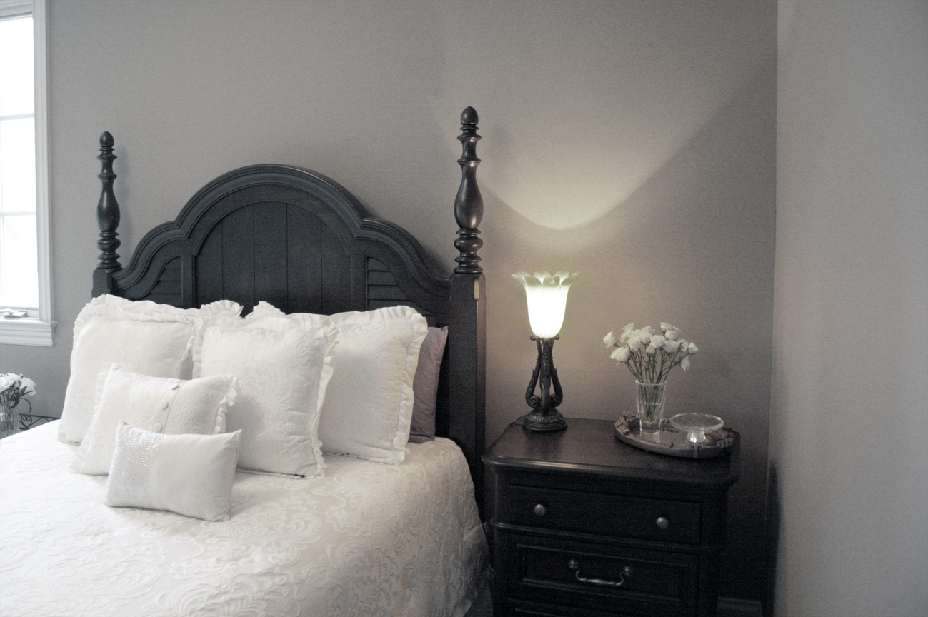 Stylish guest bedroom with custom coordinated color palate and painted professionally by Faux Décor.