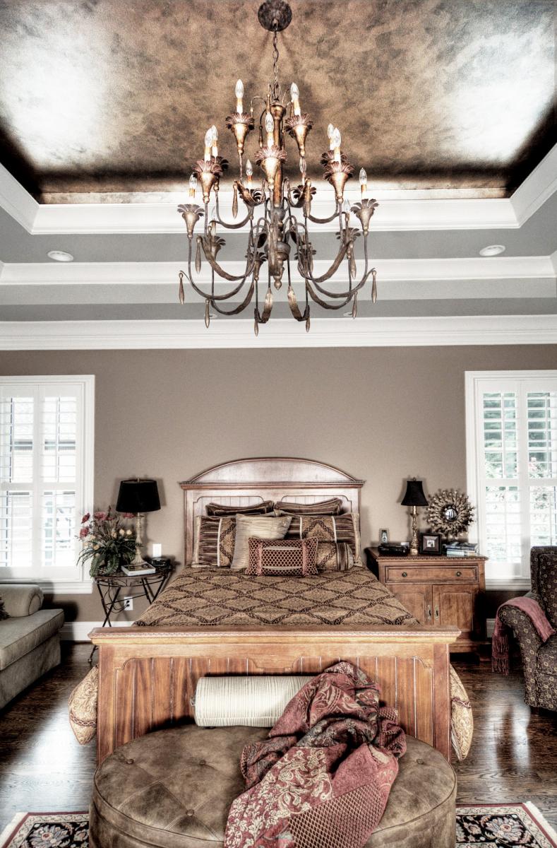 A bronze, silver and gold metallic ceiling with an accent colored tray-ceiling was the perfect combination for this Franklin, TN customer's bedroom.