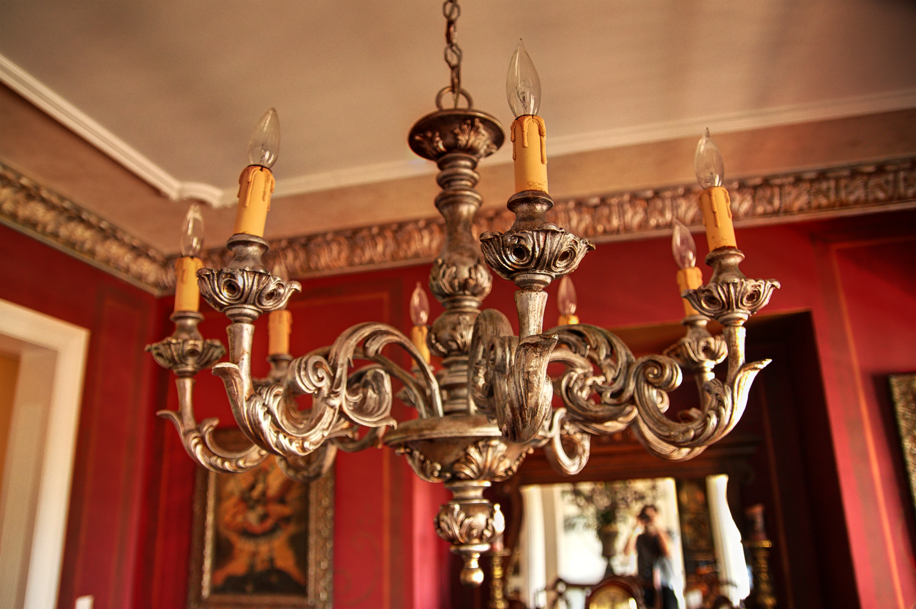 Chandelier design change finished:  from its previous garish gold to this beautiful gilt and antique silver look.