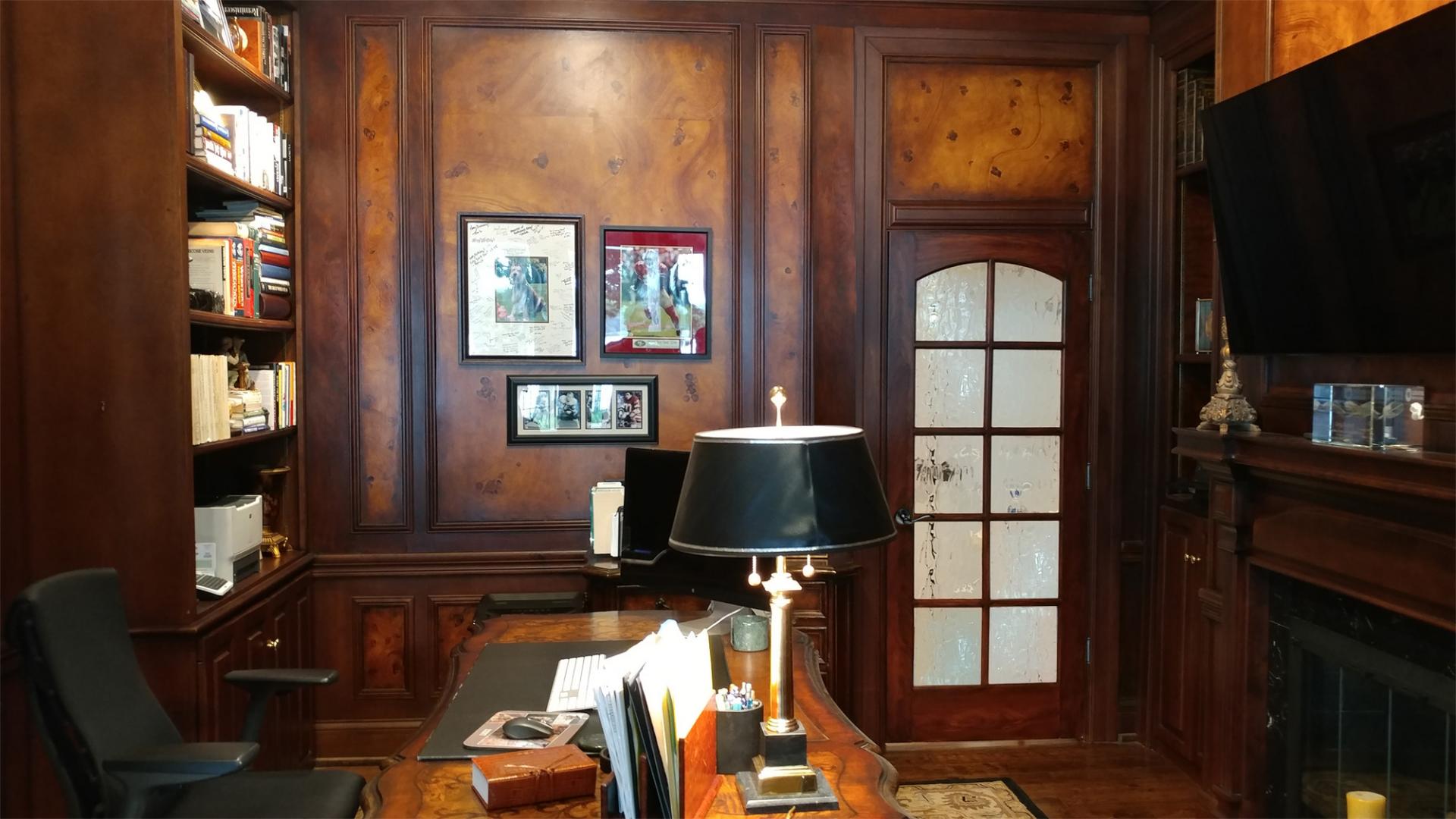 faux burl and wood grained panels and mahogany wood grained walls office view