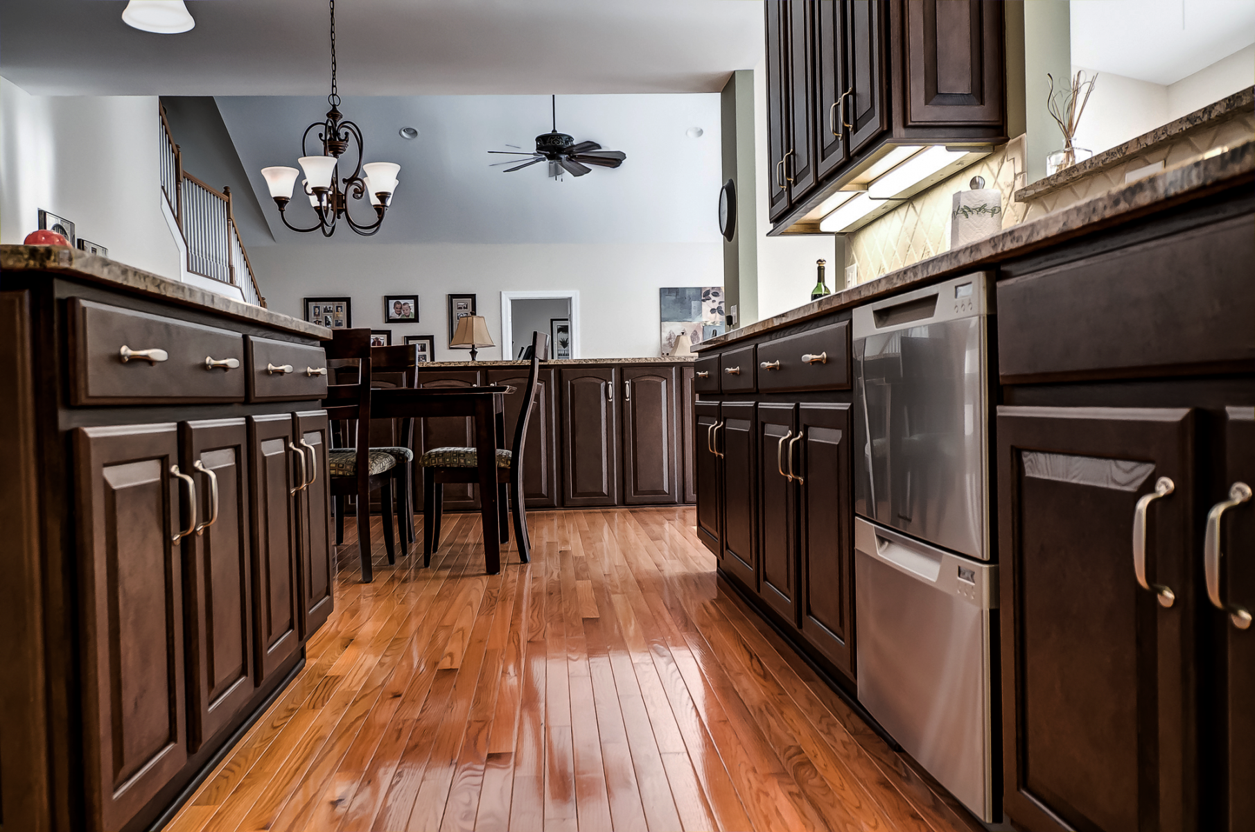 Kitchen cabinet refinished in a rich furniture finish