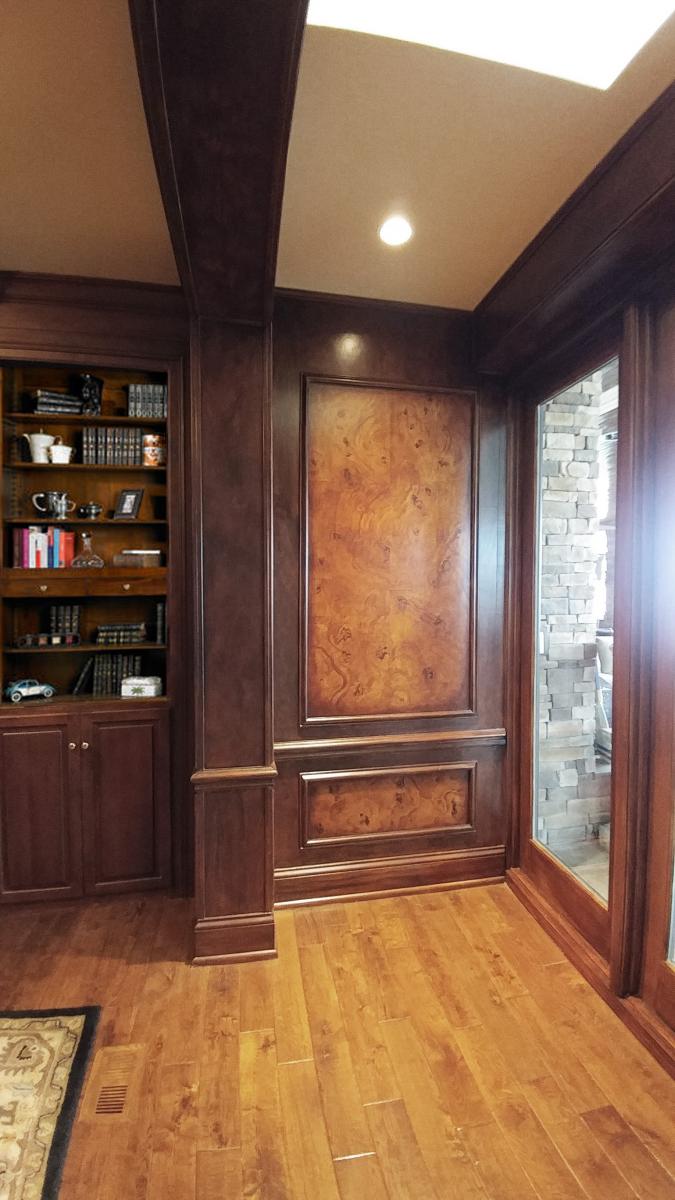 faux burl and wood grained panels and mahogany wood grained walls