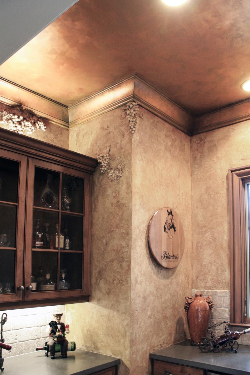 Faux Décor’s sculpted grapes and Tuscany plastered walls and faux copper ceiling for this Brentwood customer’s wine room.