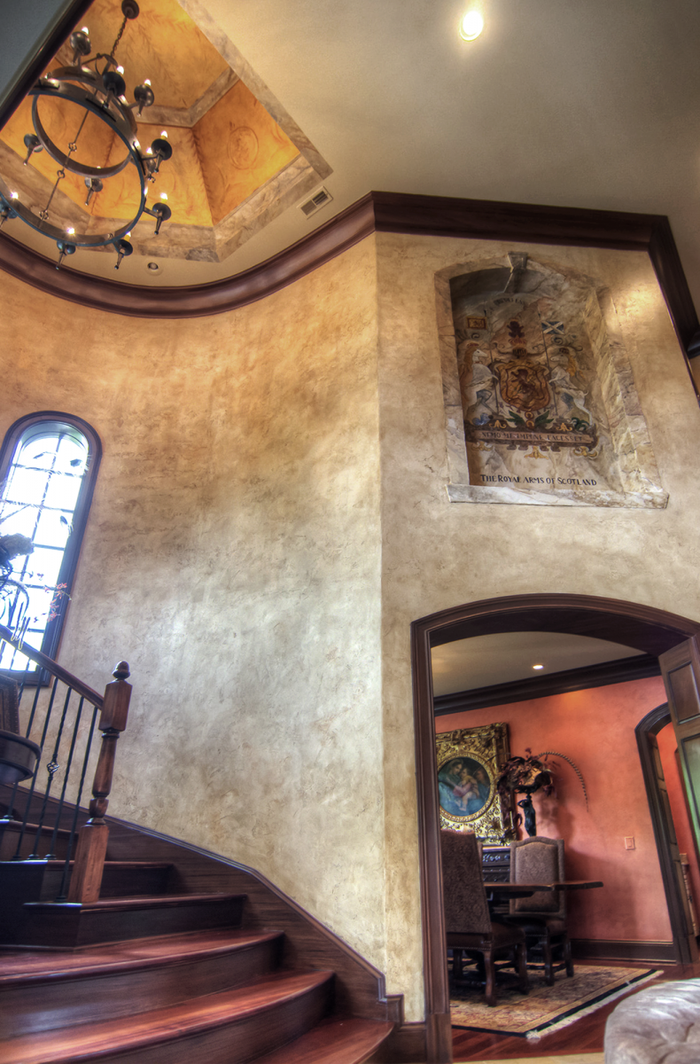 After shots of this projects entry hall makeover - French plaster walls, wood trim glazing, wall and ceiling murals and metallic cooper wall designs. Stunning!