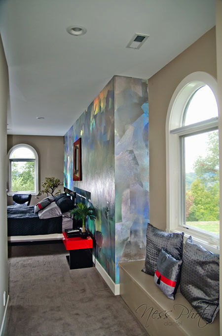 Modern look of holographic foil and ruby red burnished Venetian plaster wall design master bedroom.