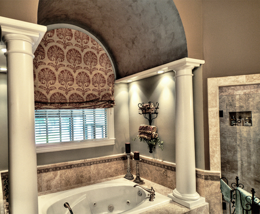 A metallic silver and gold barrel ceiling with accent colored walls make this Franklin, TN customer’s master bath the perfect spa retreat.