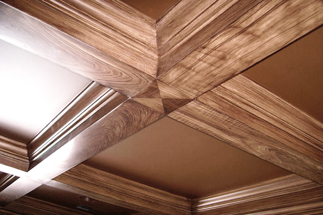 Faux wood grained coffer great room ceiling.